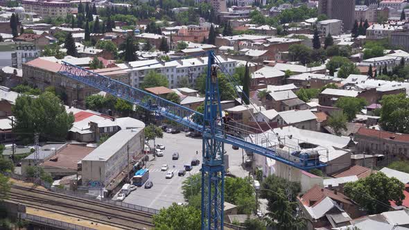 Workers Are Repairing The Crane