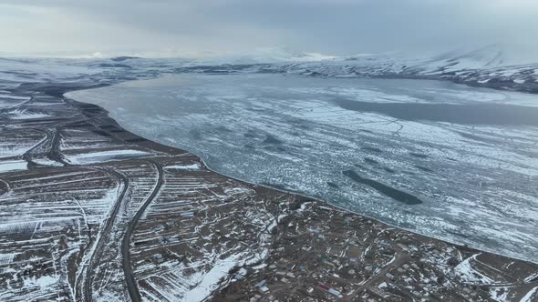 Aerial view of frozen Lake Paravani. The largest lake in Georgia