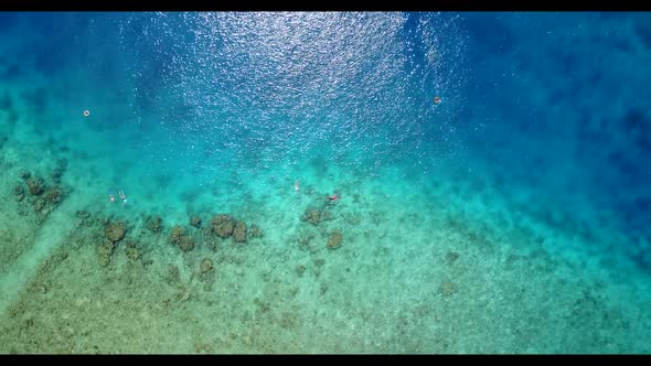 Aerial top down nature of perfect resort beach journey by transparent ocean and bright sand backgrou