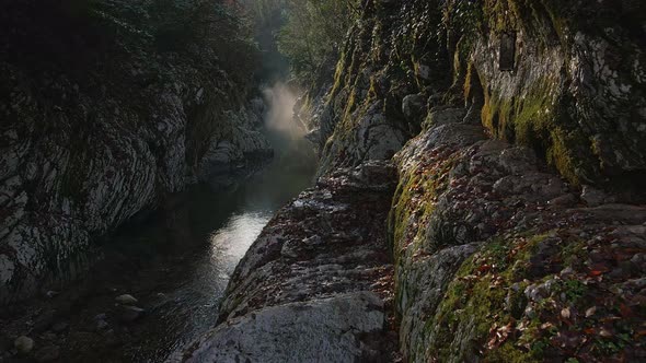 River in a Narrow Canyon with White Rocks