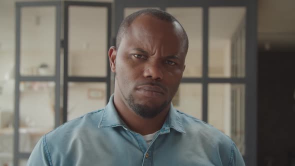 Furious Black Man Looking with Intense Angry Stare