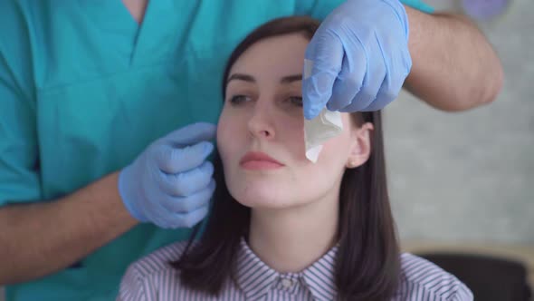 Closeup of the Face of a Happy Young Beautiful Woman After Plastic Surgery on the Face