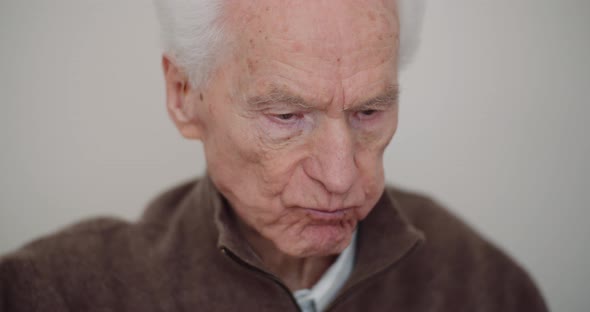 Retirement - Senior Man Eating Sandwitch.