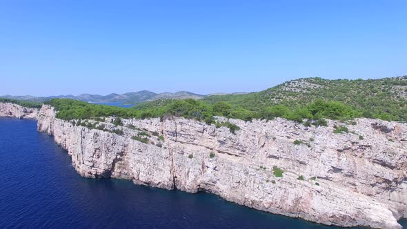 Aerial view of Dalmatian shore with cliffs and the famous salty lake