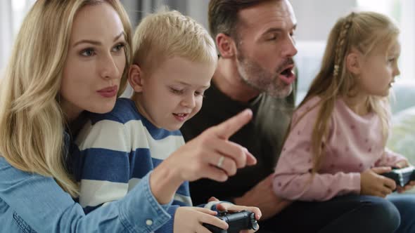 Happy family playing video game