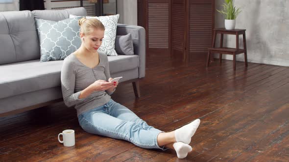 Young woman is resting at home