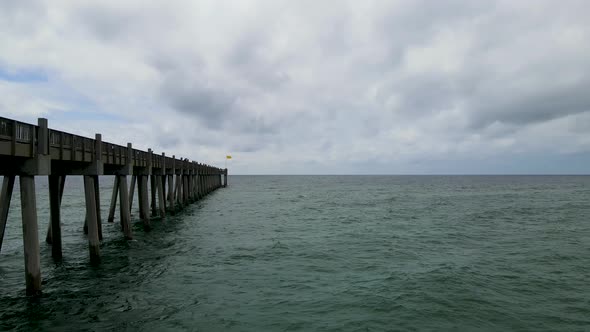 Pensacola Beach Gulf Pier in Florida - Aerial Flying Drone View