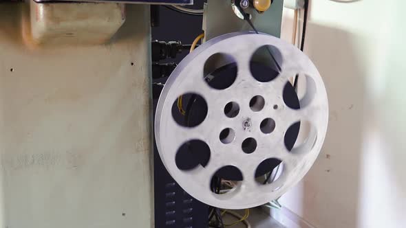 Old Film Reel Coiled on Retro Cinema Projector Large Spool