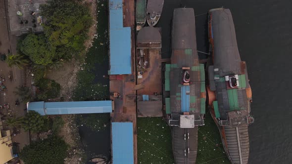 Paddle rocket steamer wharf. Old traditional ancient vessel. Top Down drone descending shot