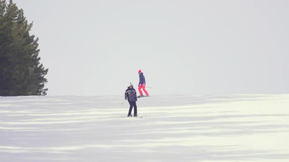 Tourists Relax at the Mountains Ski Resort