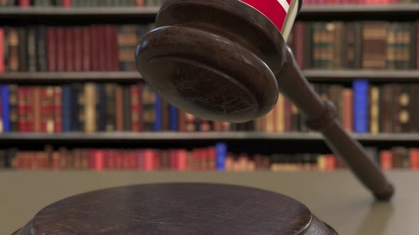 Flag of Denmark on Falling Judges Gavel in Court