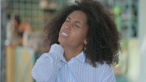 Tired African Woman Having Neck Pain