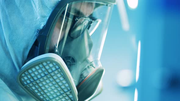 Face of a Laboratory Specialist Wearing a Hazmat Mask