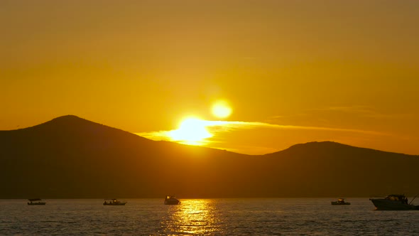 Boats seen at sunset