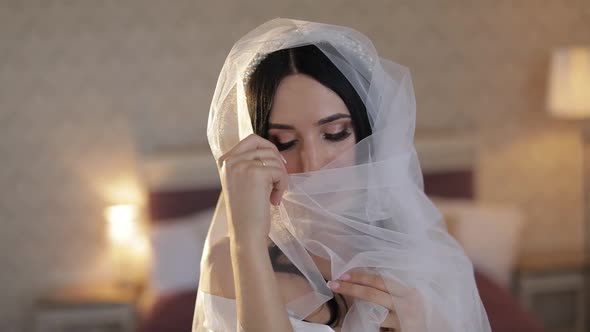 Beautiful and Lovely Bride in Night Gown and Veil, Wedding Morning, Slow Motion