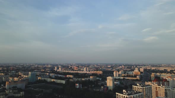 City block construction site. Multi-storey buildings. City landscape at sunrise. Aerial photography.