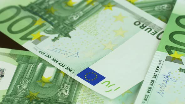 Close-up of 100 euro banknotes rotate. Fall in European markets