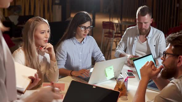 Woman Director Is Talking with Workers of Her Company in Office