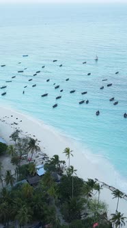 Boat Boats in the Ocean Near the Coast of Zanzibar Tanzania Slow Motion Vertical Video