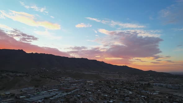 El Paso, Texas During Beautiful Colorful Sunrise With Cloudy Twilight Sky And Franklin Mountains In