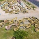 Aerial top view of new truck tractor cars parking for sale stock lot row, dealer inventory import - VideoHive Item for Sale