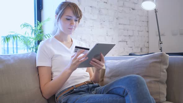 Online Shopping on Tablet PC by Sitting Woman