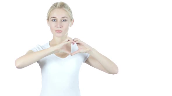 Handmade Heart Sign by Young Woman