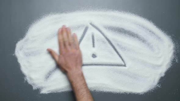Sign Warning revealing on sugar surface. Sugar kills. No sugar. Stop diabetes. Obesity.