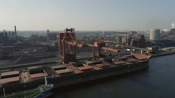 Ship Unloading Cargo at a Port for Processing at a Refinery