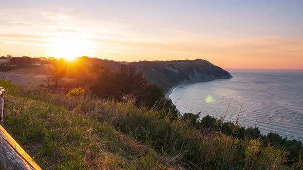 Time lapse: sunset landscape Conero natural park dramatic coast headland rocky cliff adriatic sea be