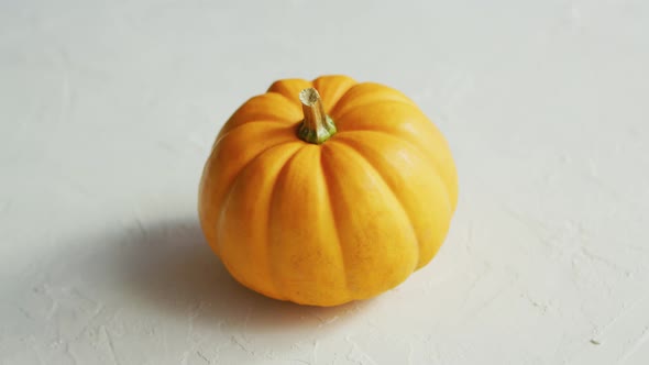 Yellow Pumpkin Laid in Middle