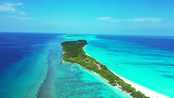 Aerial sky of idyllic lagoon beach voyage by blue water and white sandy background of a dayout near 