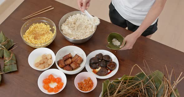 Chinese Woman Make Rice Dumpling