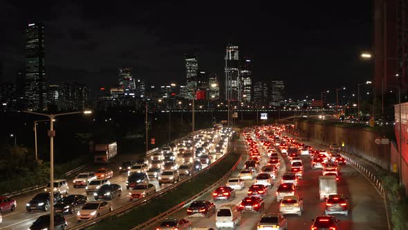 Traffic jam in Seoul, South Korea at night on major highway, Gangbyeonbuk-ro.