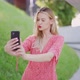 Cheerful Female Taking Selfie in Park - VideoHive Item for Sale
