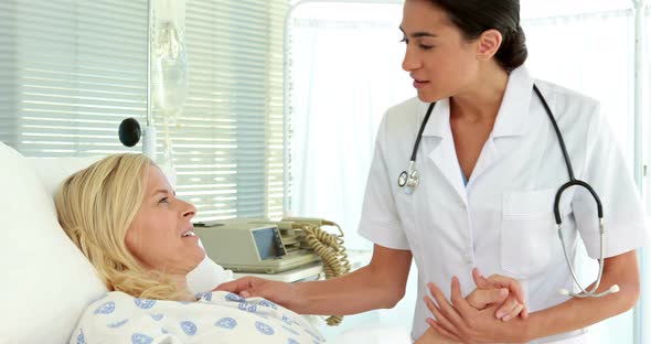 Doctor speaking with her patient