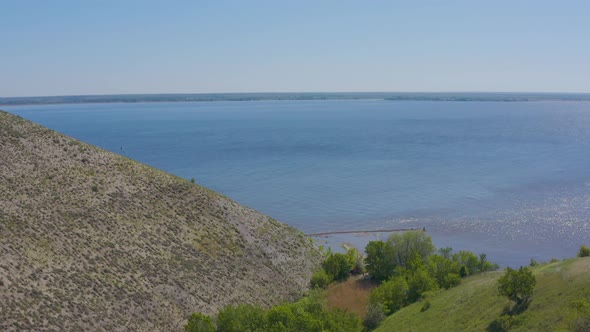 Steep Bank of the River From a Bird's Eye View. Bank of the Volga River in Russia. Aero 