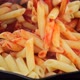Stir pasta and tomato sauce in pan, close up - VideoHive Item for Sale