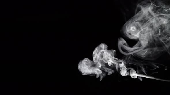 Smoke Floating Against Black Background