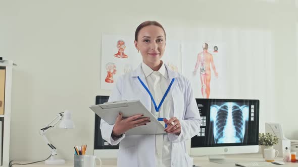 Portrait of Beautiful Female Doctor in Clinic