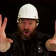 Concept idea: Bearded construction worker tries to stop someone with hand signals - VideoHive Item for Sale