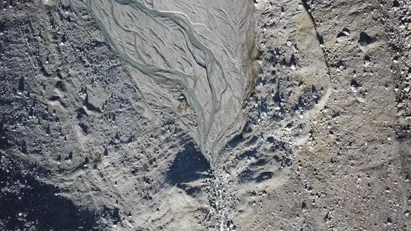 River delta next to a glacier, Switzerland, alps. drone aerial view