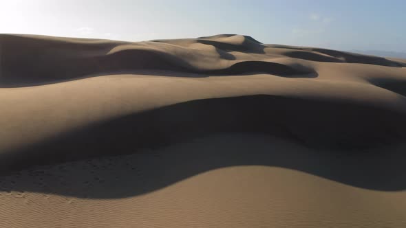  Aerial Drone View Flying By Beautiful Wavy Sand Dunes in Golden Sunset Light