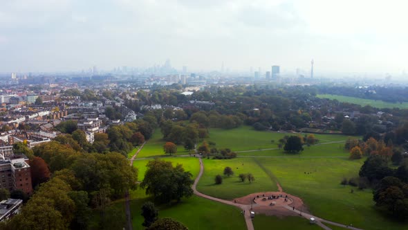 Beautiful Aerial View of London with Many Green Parks and City Skyscrapers