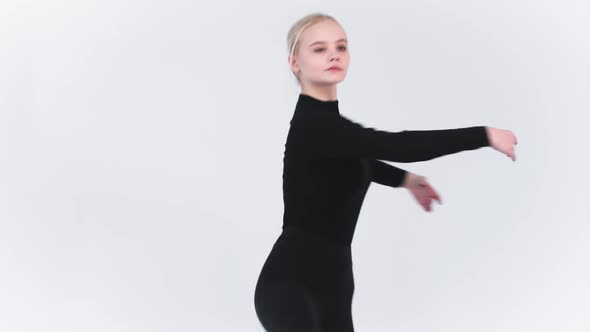 Ballet  Young Blonde Woman Doing Spins in the Studio