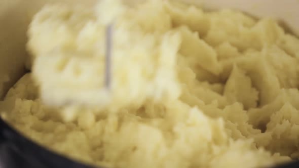 Step by step. Preparing classic mashed potatoes for Thanksgiving dinner.