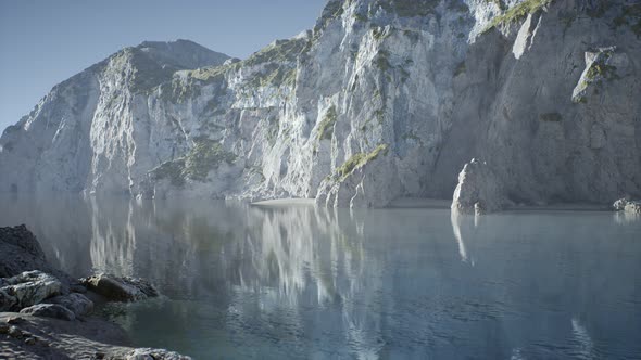 Sand Beach Among Rocks at Atlantic Ocean Coast in Portugal alt