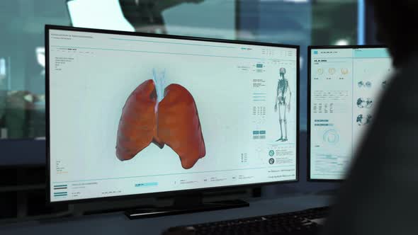 Doctor At Hospital Analyzing Result Of Lungs Scan In X-ray Examination Interface alt