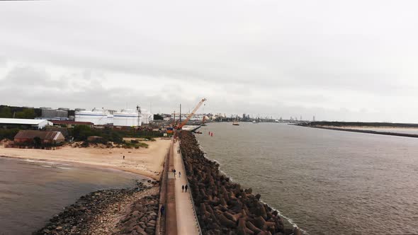 Scenic Baltic Coast With  Klaipeda Port Background