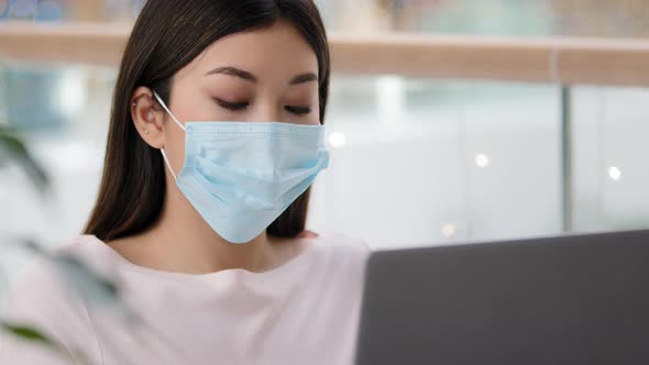 Asian Student Korean Business Woman in Medical Face Mask Freelancer Writer Journalist Typing Working